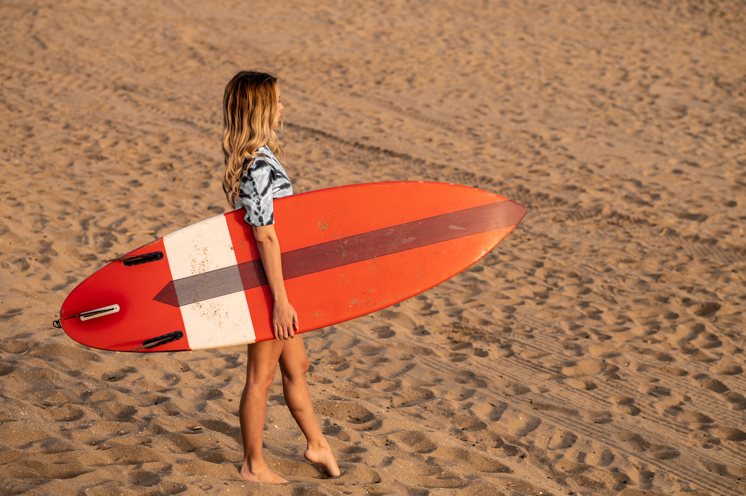 Female Surfer on the Beach